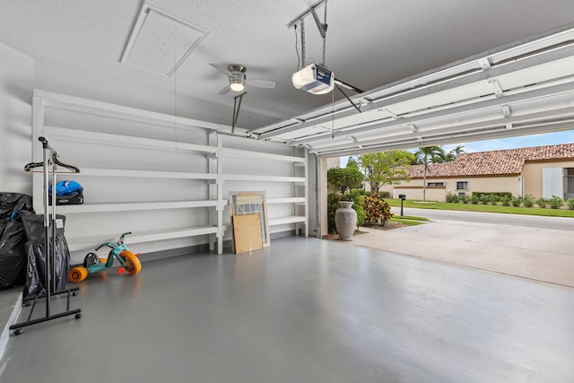 10056 Lexington Cir N, Boynton Beach, FL 33436 - garage featuring a garage door opener