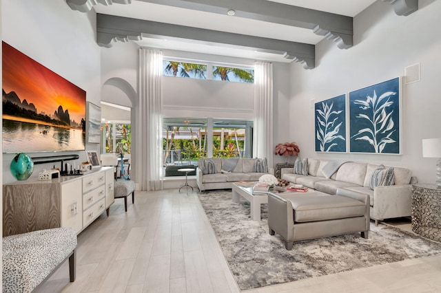 5747 Paddington Way, Boca Raton, FL 33496 - living area featuring a high ceiling and beam ceiling