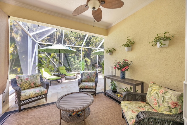sunroom / solarium featuring a ceiling fan and outdoor lounge area