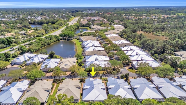 aerial view with a residential view and a water view
