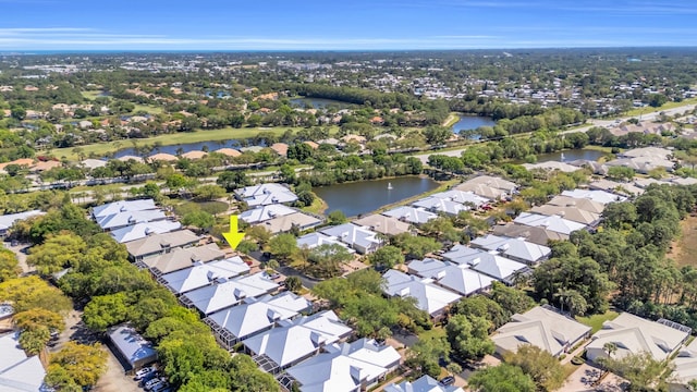 bird's eye view with a water view and a residential view