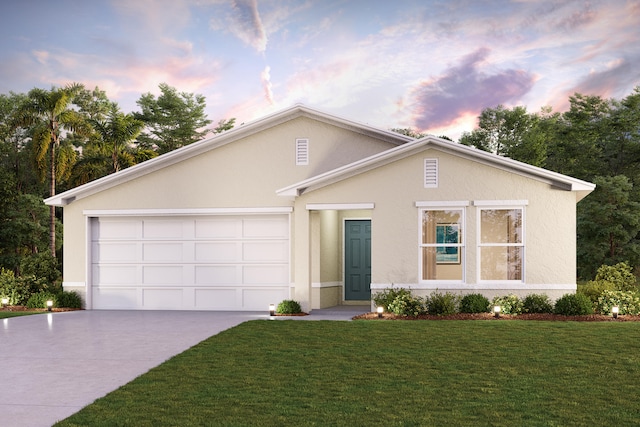 single story home with an attached garage, stucco siding, driveway, and a front lawn
