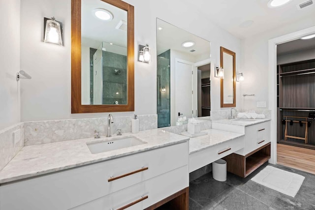 5288 Alton Rd Share B, Unit Share B, Miami Beach, FL 33140 - bathroom featuring a walk in closet, visible vents, tile patterned flooring, a stall shower, and vanity