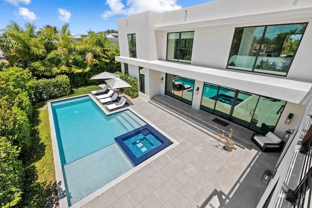 5288 Alton Rd Share B, Unit Share B, Miami Beach, FL 33140 - view of swimming pool featuring a patio and a pool with connected hot tub
