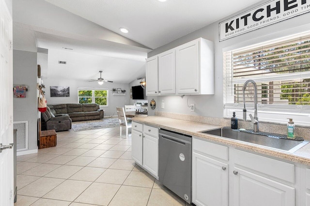 17109 81st Ln N, Loxahatchee, FL 33470 - kitchen featuring ceiling fan, a sink, dishwasher, white cabinetry, and lofted ceiling