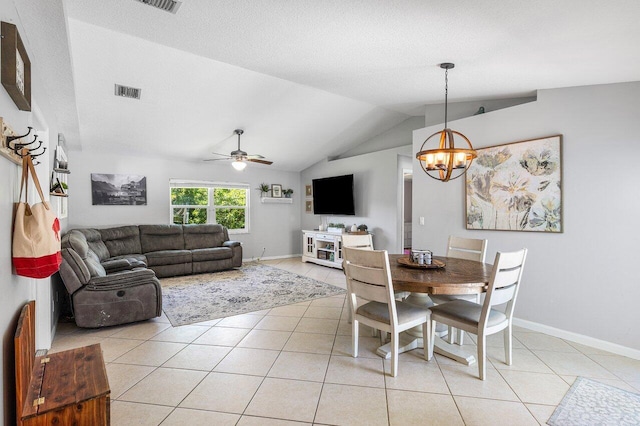 17109 81st Ln N, Loxahatchee, FL 33470 - dining area featuring light tile patterned flooring, baseboards, visible vents, and lofted ceiling