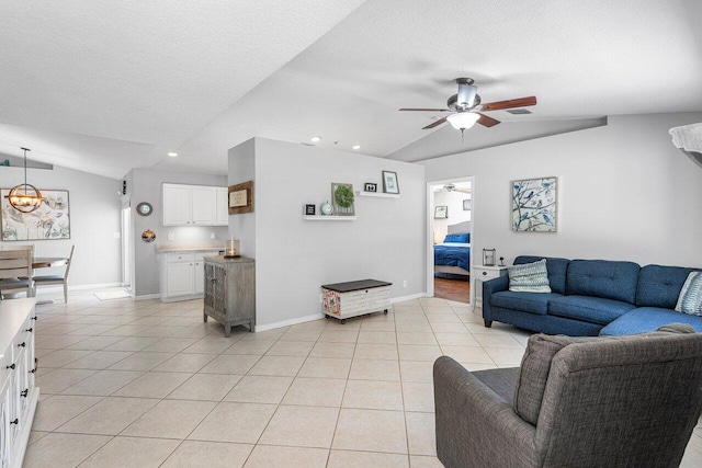 17109 81st Ln N, Loxahatchee, FL 33470 - living area with light tile patterned flooring, ceiling fan, and lofted ceiling