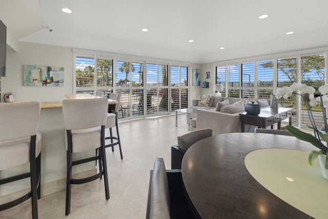 dining area featuring recessed lighting