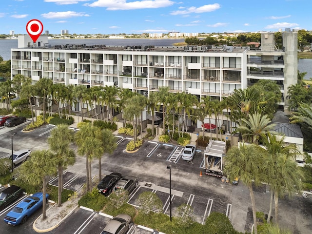 view of property with uncovered parking