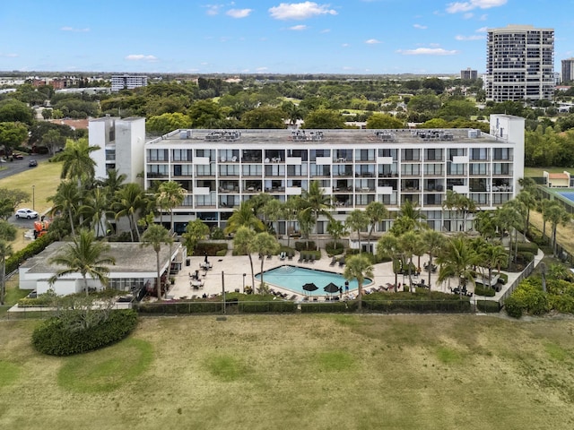 birds eye view of property with a view of city