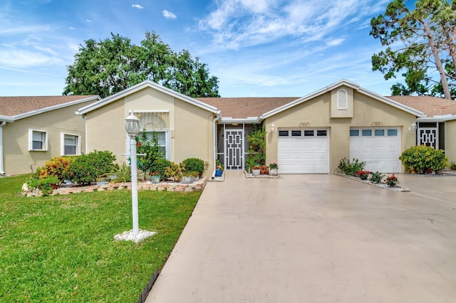 3516 Westminster Dr, Greenacres, FL 33463 - ranch-style house with a garage, stucco siding, a front yard, and driveway