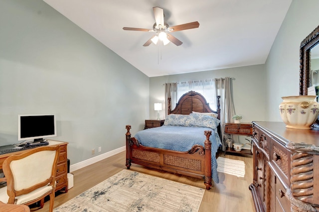 3516 Westminster Dr, Greenacres, FL 33463 - bedroom featuring lofted ceiling, wood finished floors, baseboards, a ceiling fan, and an office area
