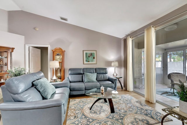 3516 Westminster Dr, Greenacres, FL 33463 - living room featuring high vaulted ceiling and light wood-type flooring