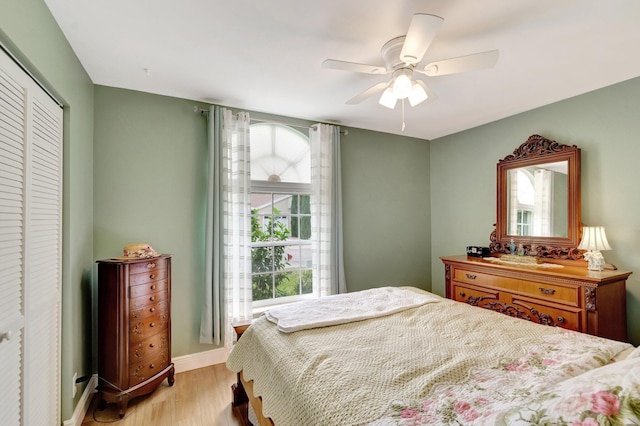 3516 Westminster Dr, Greenacres, FL 33463 - bedroom featuring multiple windows, light wood-type flooring, and a closet