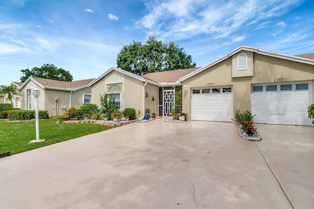 3516 Westminster Dr, Greenacres, FL 33463 - single story home featuring stucco siding, concrete driveway, a front yard, and an attached garage