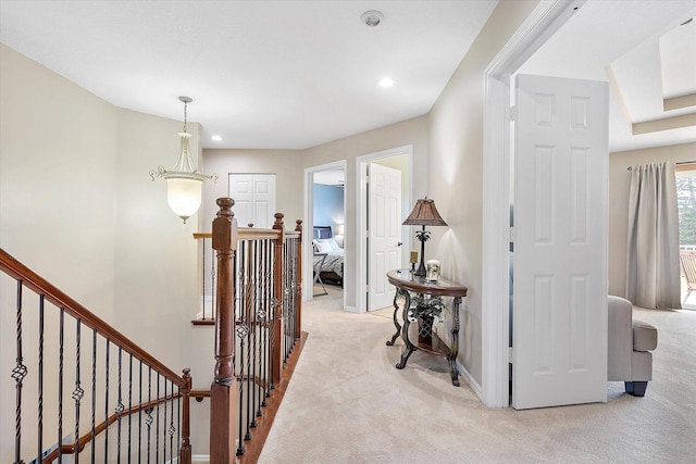 6616 NW 56th Dr, Coral Springs, FL 33067 - corridor featuring an upstairs landing, light carpet, baseboards, and recessed lighting