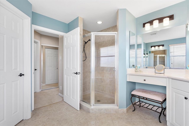 6616 NW 56th Dr, Coral Springs, FL 33067 - bathroom featuring a shower stall, baseboards, and tile patterned flooring