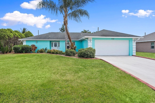 130 SW Airview Ave, Port Saint Lucie, FL 34984 - ranch-style house featuring stucco siding, a garage, concrete driveway, and a front yard