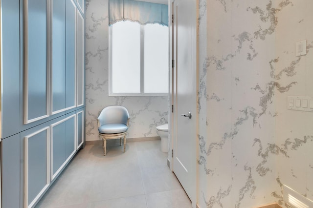 20155 Boca W Dr Unit Phc902, Boca Raton, FL 33434 - bathroom featuring toilet, tile patterned flooring, and baseboards
