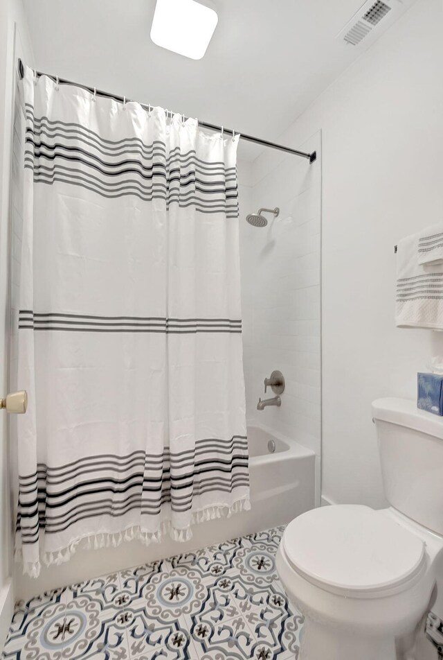 1150 Boxwood Dr Unit 203, Delray Beach, FL 33445 - full bathroom with tile patterned floors, shower / bath combo, toilet, and visible vents