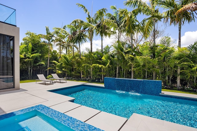 outdoor pool with a patio
