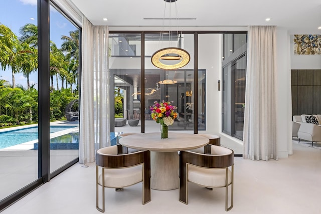 dining room featuring a wall of windows