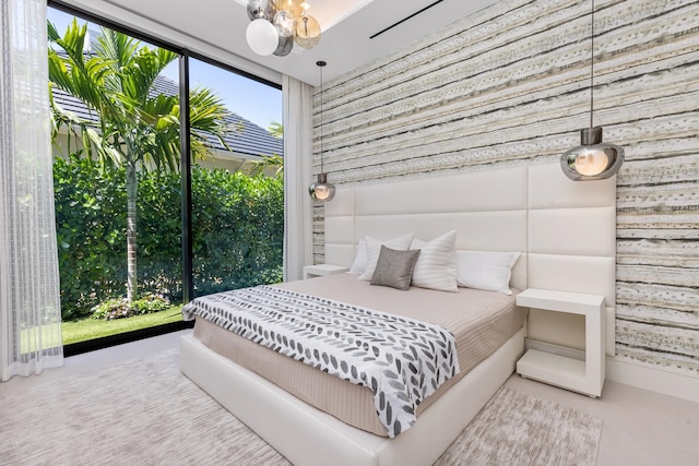 bedroom with floor to ceiling windows