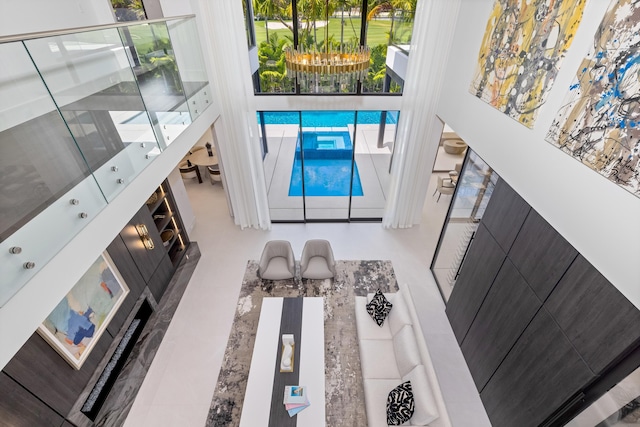 living area featuring a chandelier