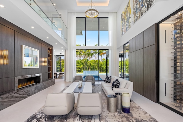 building lobby featuring a towering ceiling and recessed lighting