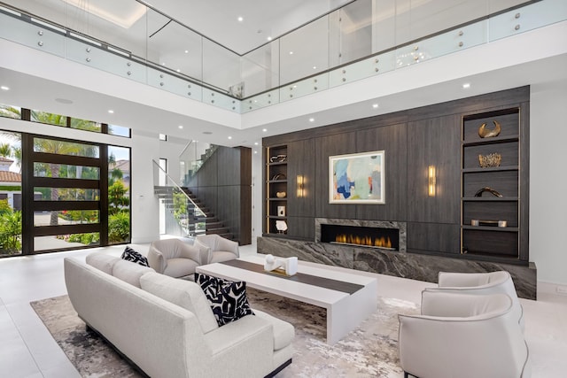 building lobby featuring a high ceiling and stairs