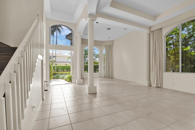 interior space with light tile patterned floors and visible vents