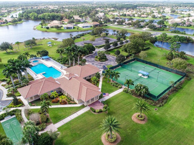 826 SW Marsh Hbr, Bay, Port Saint Lucie, FL 34986 - aerial perspective of suburban area featuring a large body of water and a pool area