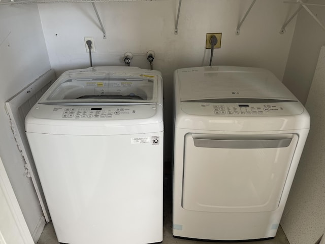 4237 Oak Terrace Dr, Greenacres, FL 33463 - washroom with laundry area and washer and clothes dryer