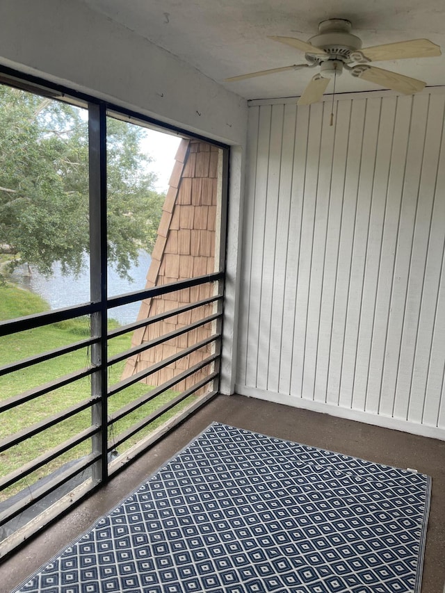 4237 Oak Terrace Dr, Greenacres, FL 33463 - unfurnished sunroom with a ceiling fan and a water view