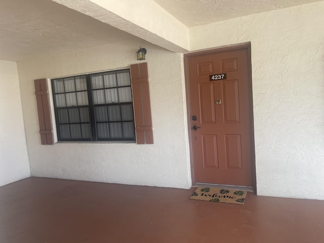 4237 Oak Terrace Dr, Greenacres, FL 33463 - doorway to property featuring stucco siding