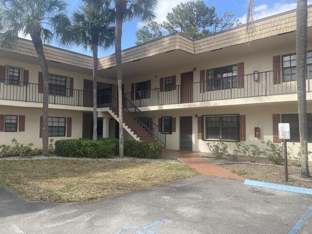 4237 Oak Terrace Dr, Greenacres, FL 33463 - view of building exterior featuring stairs