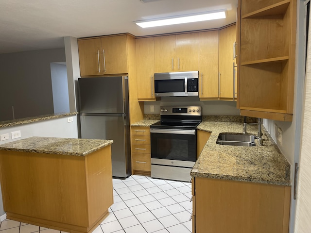 4237 Oak Terrace Dr, Greenacres, FL 33463 - kitchen with appliances with stainless steel finishes, open shelves, a sink, light tile patterned floors, and light stone counters