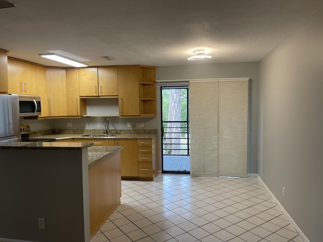 4237 Oak Terrace Dr, Greenacres, FL 33463 - kitchen with light tile patterned flooring, open shelves, a sink, stainless steel appliances, and visible vents