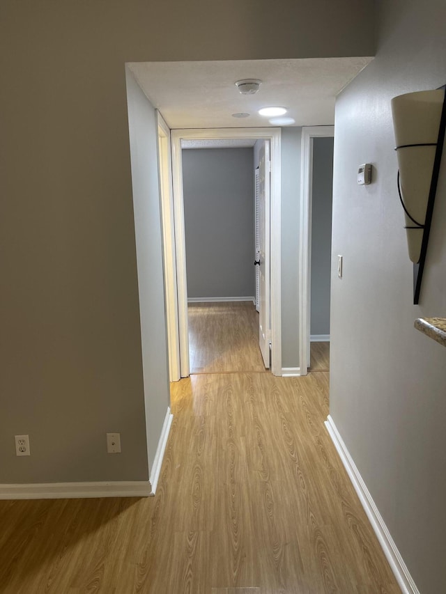 4237 Oak Terrace Dr, Greenacres, FL 33463 - corridor featuring light wood-style floors and baseboards