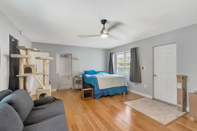 431 Virginia Dr, Lake Worth Beach, FL 33461 - bedroom with light wood-style floors, baseboards, and ceiling fan