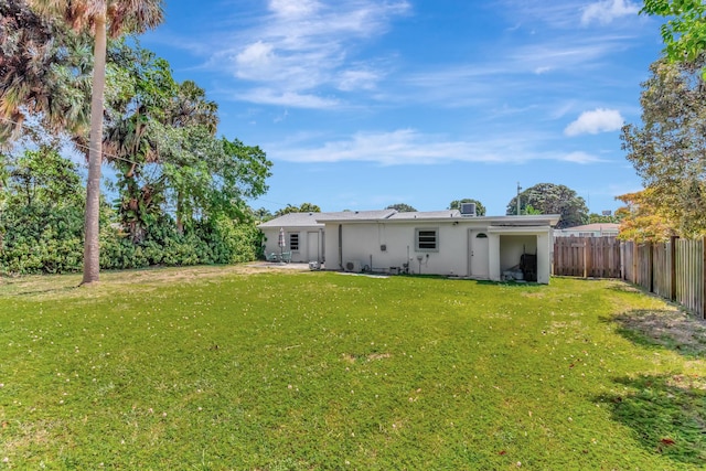 431 Virginia Dr, Lake Worth Beach, FL 33461 - back of house with stucco siding
