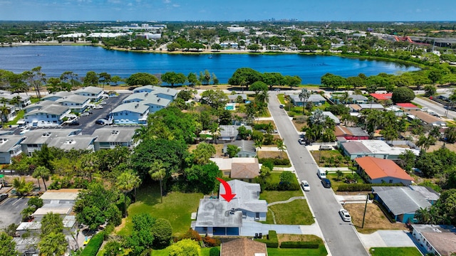 431 Virginia Dr, Lake Worth Beach, FL 33461 - aerial perspective of suburban area featuring a nearby body of water