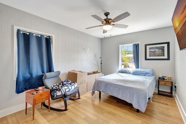 431 Virginia Dr, Lake Worth Beach, FL 33461 - bedroom with light wood-style flooring, ceiling fan, and baseboards