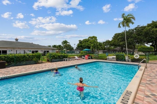 pool featuring fence
