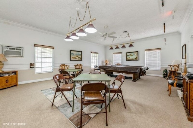 carpeted dining space featuring a healthy amount of sunlight, billiards, ornamental molding, and a wall mounted air conditioner
