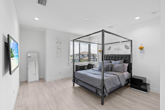 10715 Estuary Dr, Parkland, FL 33076 - bedroom featuring recessed lighting, baseboards, visible vents, and wood finished floors