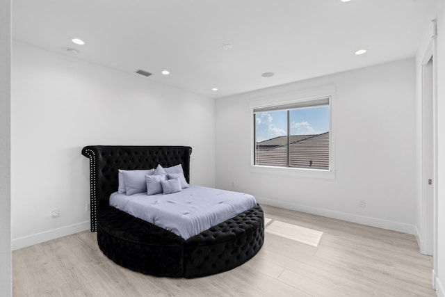 10715 Estuary Dr, Parkland, FL 33076 - bedroom with recessed lighting, baseboards, visible vents, and light wood finished floors