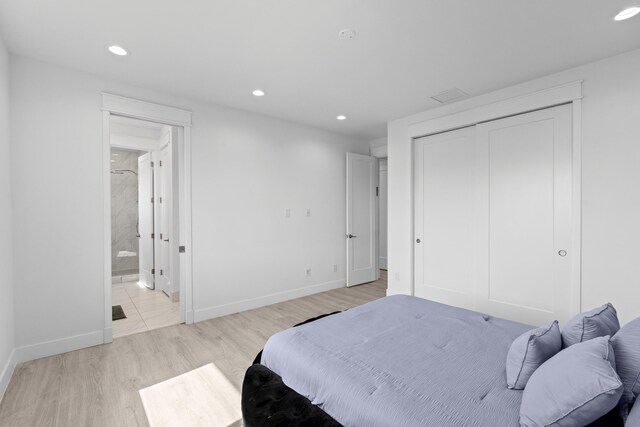 10715 Estuary Dr, Parkland, FL 33076 - bedroom featuring recessed lighting, baseboards, and light wood-style floors