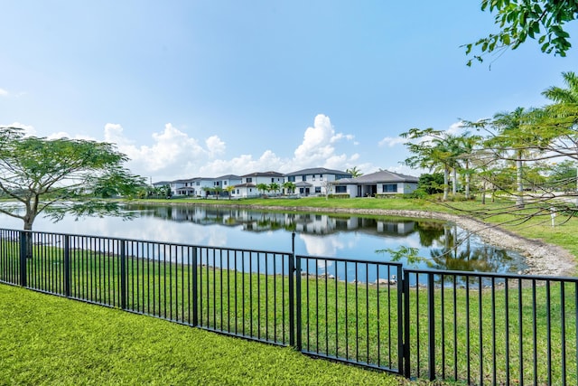 10715 Estuary Dr, Parkland, FL 33076 - property view of water with fence and a residential view