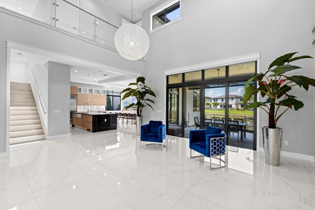10715 Estuary Dr, Parkland, FL 33076 - community lobby with stairs and a sink